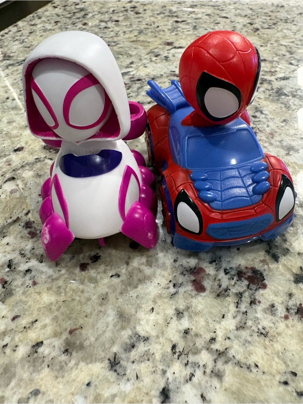 Spidey and friend in cars Preowned white car has minor wear